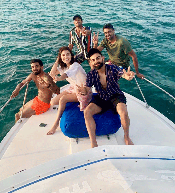 KL Rahul, R Ashwin, Mayank Agarwal with Virat Kohli and Anuskha Sharma, seen enjoying a boat ride in the West Indies