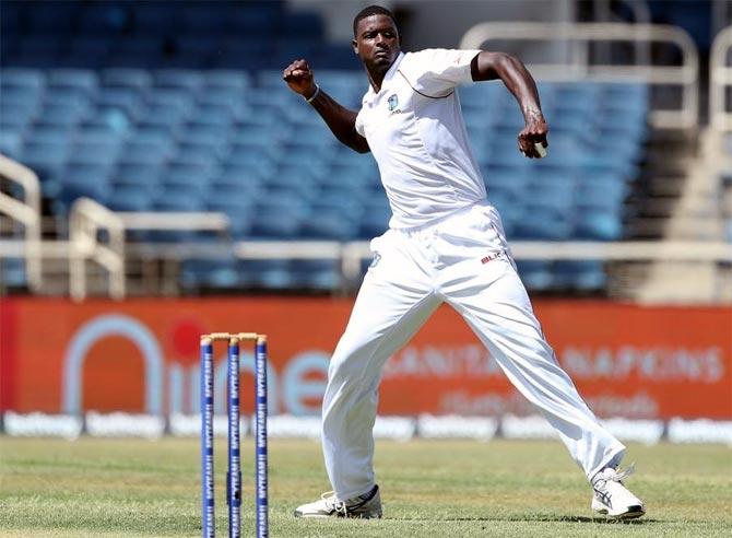 Jason Holder celebrates after dismissing K L Rahul.