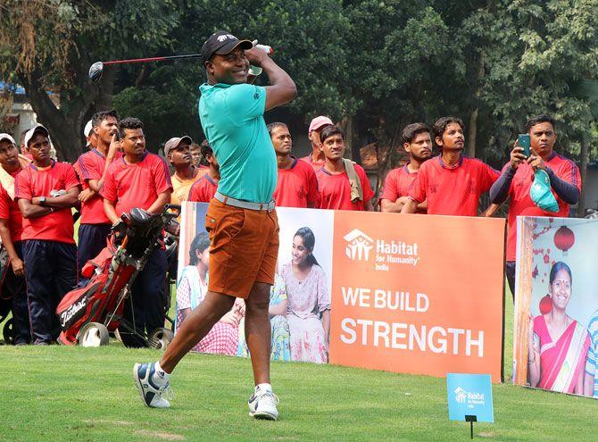 Former West Indies batting great Brian Lara plays golf at a promotional event in Mumbai on Friday