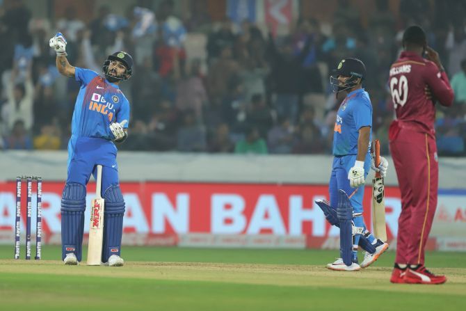 Virat Kohli teases Kesrick Williams during the first T20I match between India and the West Indies at the Rajiv Gandhi International Stadium in Hyderabad on Friday