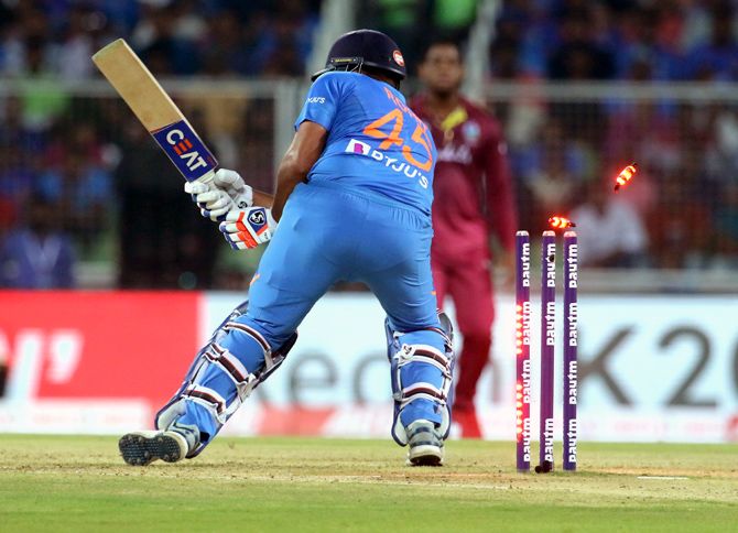  Rohit Sharma (15) is bowled by Jason Holder in the 2nd T20I on Sunday