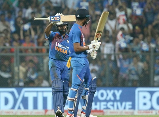 Rohit Sharma celebrates his 50.