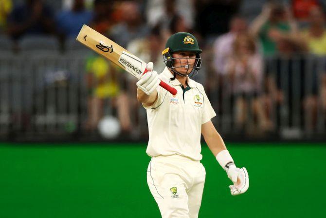 Australia's Marnus Labuschagne celebrates after reaching his half century