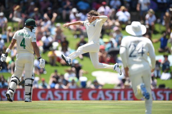 England bowler Sam Curran celebrates after dismissing South Africa's Aiden Markram