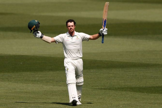 Australia's Travis Head celebrates on scoring his century