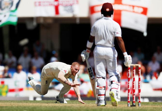 England's Ben Stokes attempts to make a catch against West Indies at Sir Vivian Richards Stadium, North Sound, Antigua and Barbuda on Friday