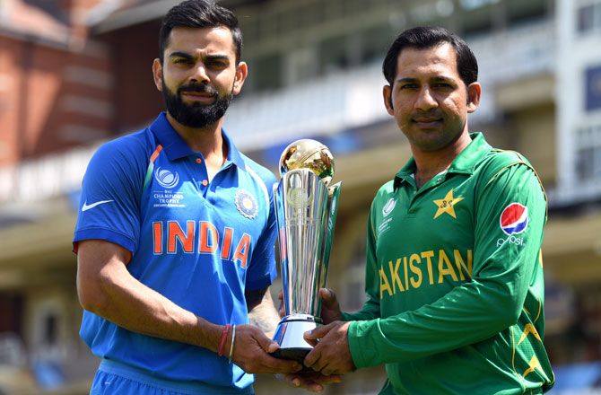  India captain Virat Kohli, left, with Pakistan skipper Sarfaraz Ahmed ahead of the 2017 ICC Champions Trophy final at Lord's