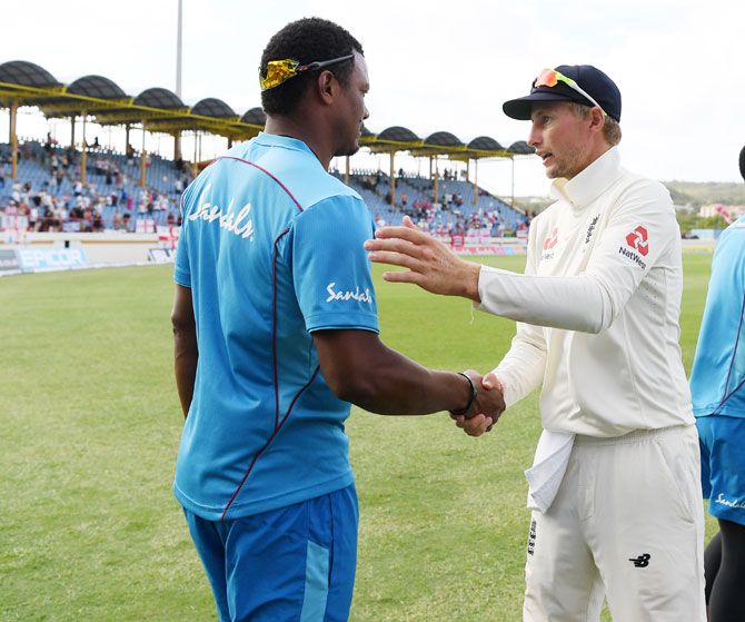England captain Joe Root shakes hands with West Indies' Shannon Gabriel following England's Victory during day 4 of the 3rd Test at Darren Sammy Cricket Ground in Gros Islet, Saint Lucia, on Tuesday