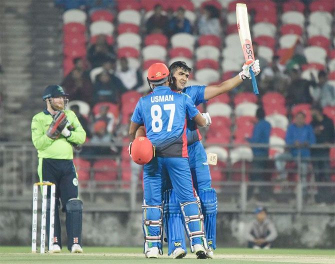 Afghanistan's Hazratullah Zazai celebrates on scoring a century. He scored the second fastest T20I century against Ireland to a record Twenty20 international total of 278-3 in Dehradun on Saturday.  The strongly-built opening batsman smashed an unbeaten 162 off 62 deliveries. Hazratullah's unbeaten 162 was the highest score by an Asian batsman in T20 Internationals