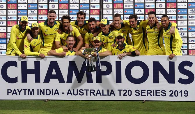 Australia's players celebrate winning the T20I series against India in Bengaluru on Wednesday