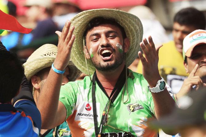 An Indian fan makes some noise on Day 1 of the 4th Test at Sydney Cricket Ground in Sydney on Thursday