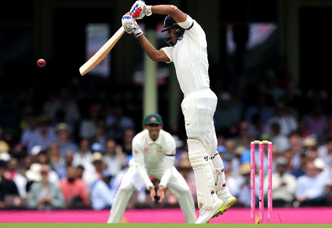 Mayank Agarwal hits a boundary through the off-side