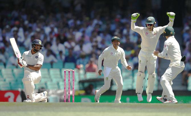 Marnus Labuschagne takes a catch to dismiss Hanuma Vihari off the bowling of Nathan Lyon