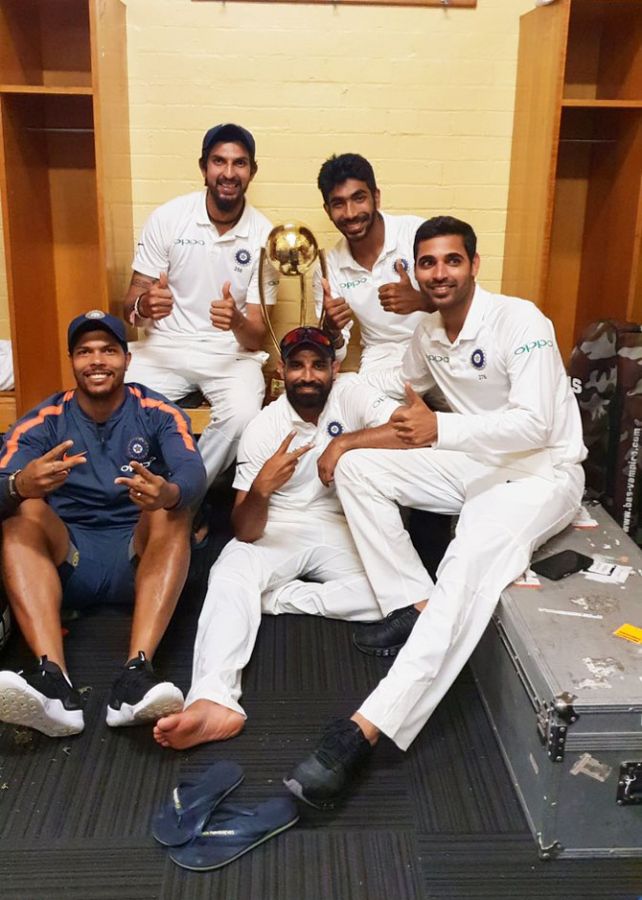 Indias's bowlers celebrate in the dressing room