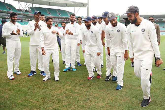 India's Virat Kohli, Ajinkya Rahane and Rishabh Pant break into a jig in celebration