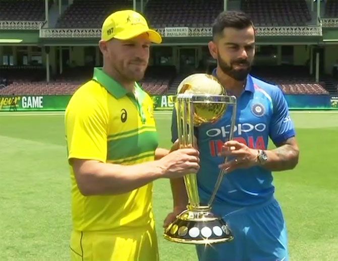 Australia ODI Captain Aaron Finch and India Captain Virat Kohli unveil the trophy on the eve of the 1st ODI at the Sydney Cricket Ground