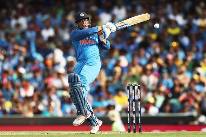 Mahendra Singh Dhoni bats during his innings of 51 against Australia in the 1st ODI in Sydney on Saturday