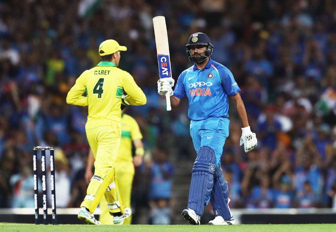 Rohit Sharma acknowledges the crowd after scoring his 22nd ODI century