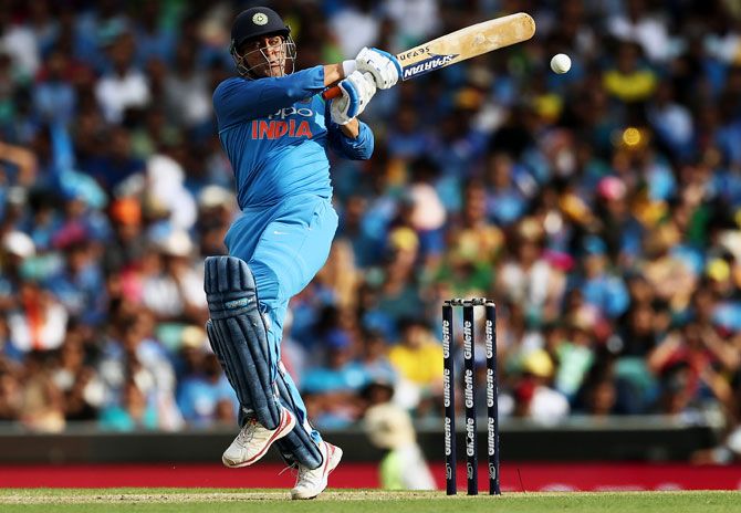Mahendra Singh Dhoni made a slow 51 from 96 balls in India's 34-run defeat to Australia in the first ODI