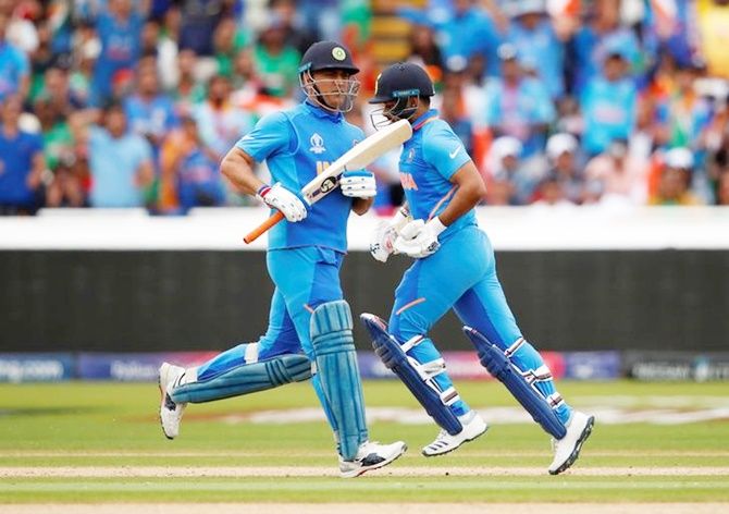  India's Mahendra Singh Dhoni and Rishabh Pant take a quick single in Tuesday's World Cup match against Bangladesh.
