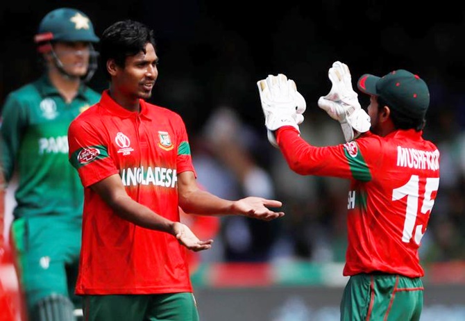 Mustafizur Rahman celebrates dismissing Mohammad Amir, his fifth wicket in the innings.
