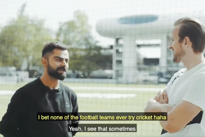 A video grab of India captain Virat Kohli chatting with England and Tottenham Hotspur captain Harry Kane on Friday