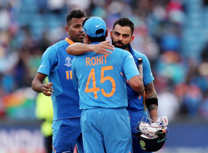 India's Virat Kohli embraces Rohit Sharma after the match 
