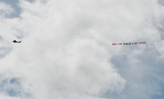 A plane with a banner flies over the match between India and Sri Lanka at Headingley, Leeds on July 6