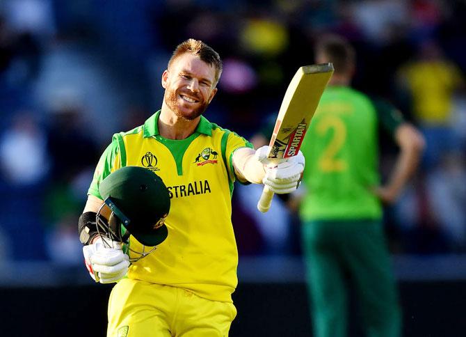 David Warner celebrates on completing his century