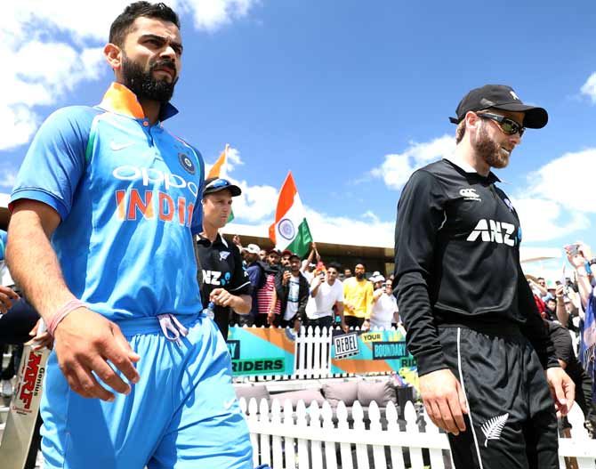 India captain Virat Kohli, left, with his New Zealand counterpart Kane Williamson