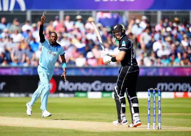 England's Jofra Archer of England celebrates dismissing New Zealand's Martin Guptill