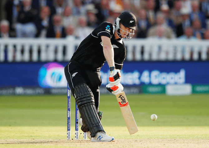 Jimmy Neesham hits a six during the Suoer Over in the World Cup final on Sunday