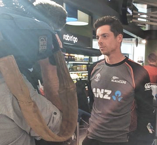Mitchell Santner speaks to local media on arrival