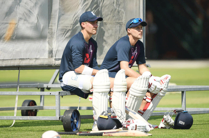 England captain Joe Root (right) and Rory Burns wait to bat during nets ahead of the Test Match against Ireland at Lord's Cricket Ground in London, England, on Tuesday