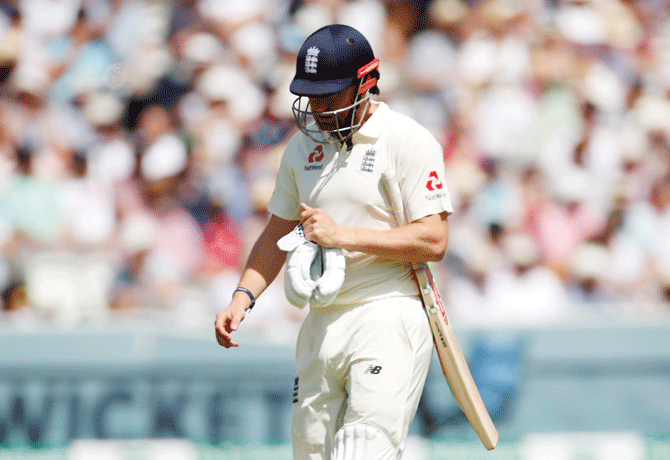 England's Jonny Bairstow walks after being bowled for a duck -- one of the three naughts in the England innings