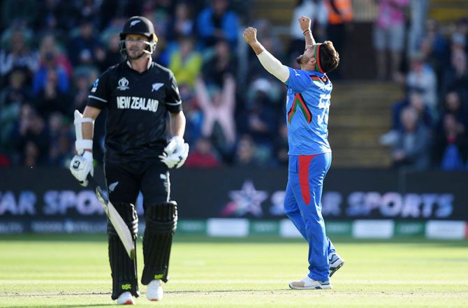 Afghanistan's Aftab Alam celebrates on dismissing New Zealand's Colin Munro