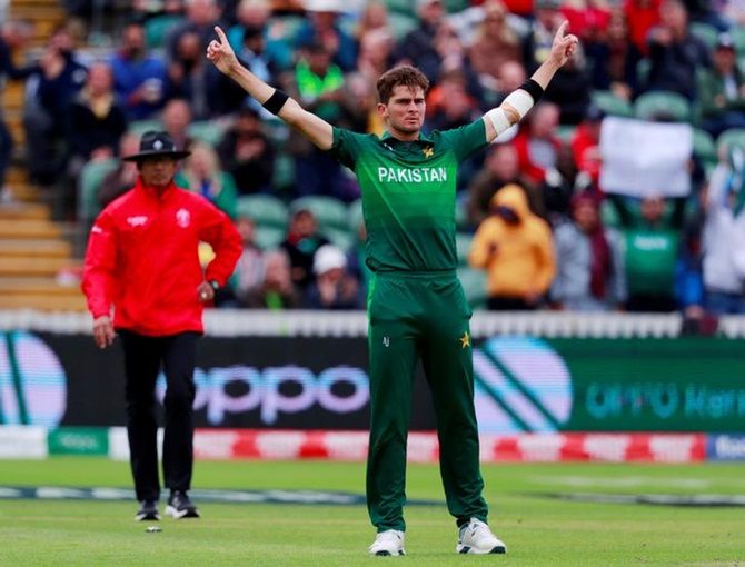 Pakistan's Shaheen Afridi celebrates taking the wicket   of Glenn Maxwell.