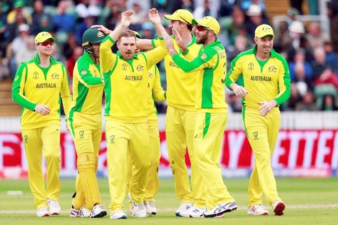 Australia's players celebrate the fall of a wicket against Pakistan at the World Cup