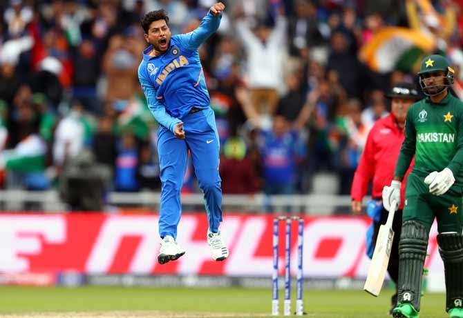 Kuldeep Yadav celebrates Babar Azam's wicket during their World Cup match on June 16