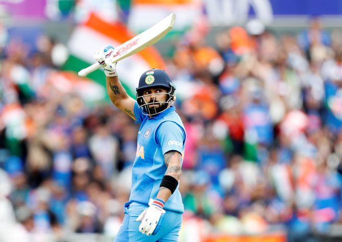 India captain Virat Kohli celebrates on reaching his 50 against Pakistan during their ICC World Cup match in Manchester on Sunday