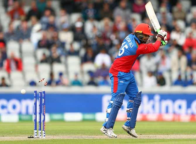 Noor Ali Zadran is bowled by Jofra Archer