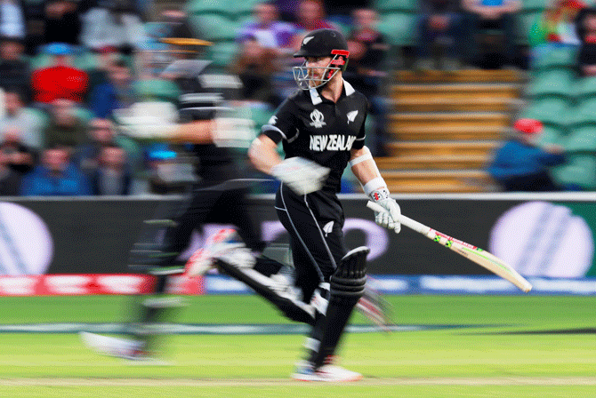 New Zealand's Kane Williamson watches the ball as he runs between the wickets during the match against South Africa on Wednesday