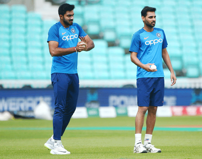 With Shikhar Dhawan already ruled out of the tournament due to thumb fracture and Bhuvneshwar Kumar (right) out for two games due to hamstring strain, Vijay Shankar's (left) injury will only increase the team management's headache