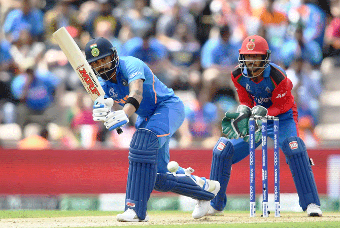 India's Virat Kohli bats en route his 67