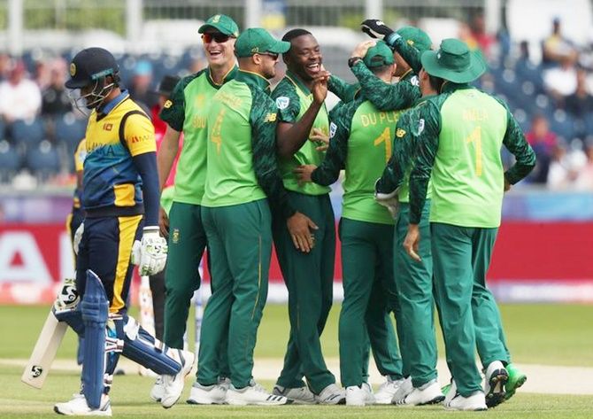 South Africa's Kagiso Rabada celebrates with teammates after dismissing Sri Lanka's Dimuth Karunaratne in Friday's World Cup match at Chester-Le-Street.