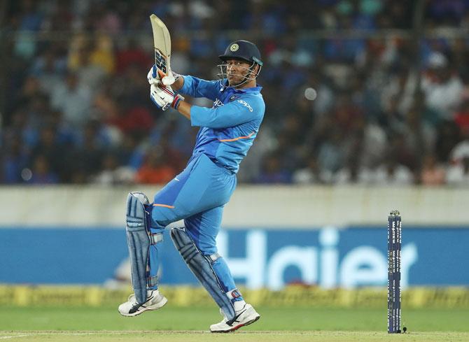 Mahendra Singh Dhoni bats en route his 71st half-century