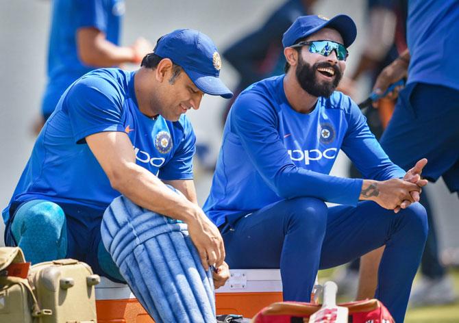 Mahendra Singh Dhoni and Ravindra Jadeja during a nets session in Nagpur on Tuesday