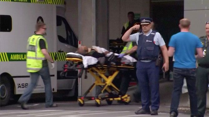 A video grab of a person being stretchered off at a hospital by emergency services personnel after reports that several shots had been fired, in central Christchurch, New Zealand on Friday