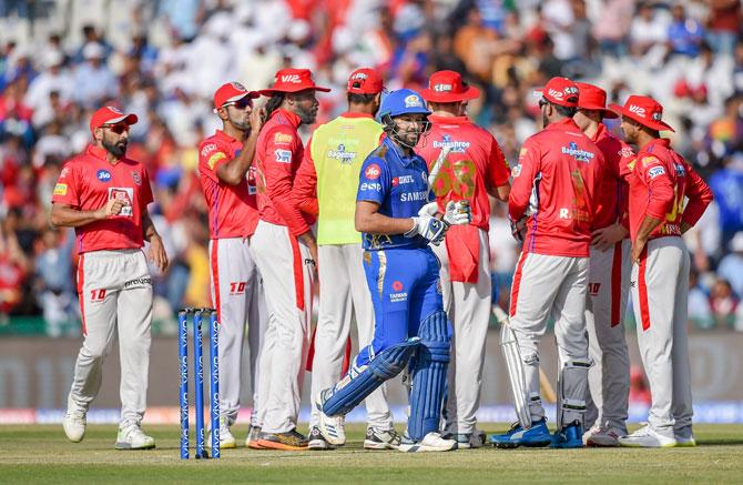 KXIP players celebrate the dismissal of Mumbai Indians skipper Rohit Sharma