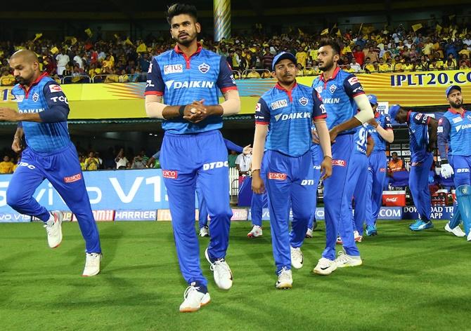 Sheyas Iyer leads the Delhi Capitals out on the field